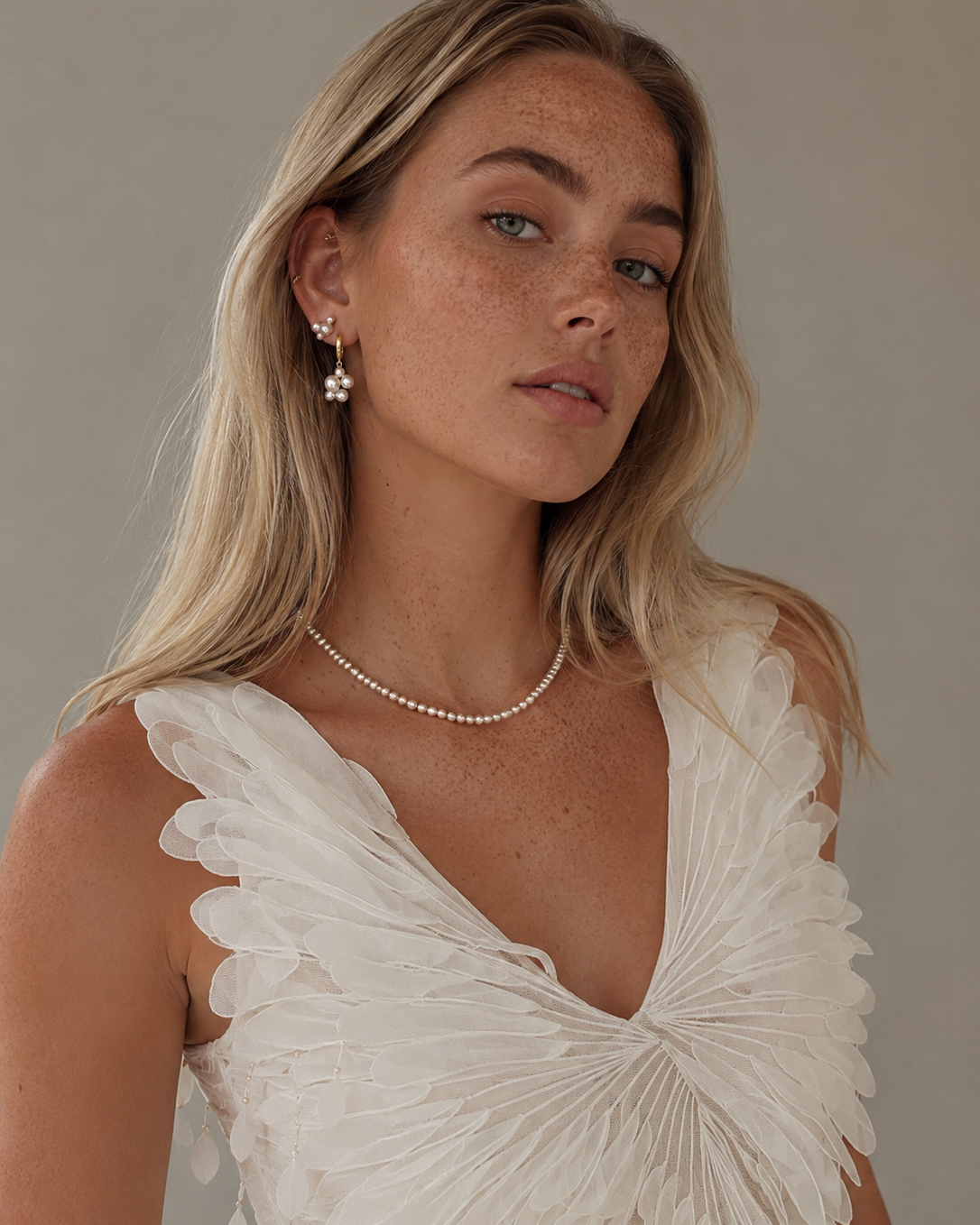 Gold-plated Aella hoops with pearl pendants
