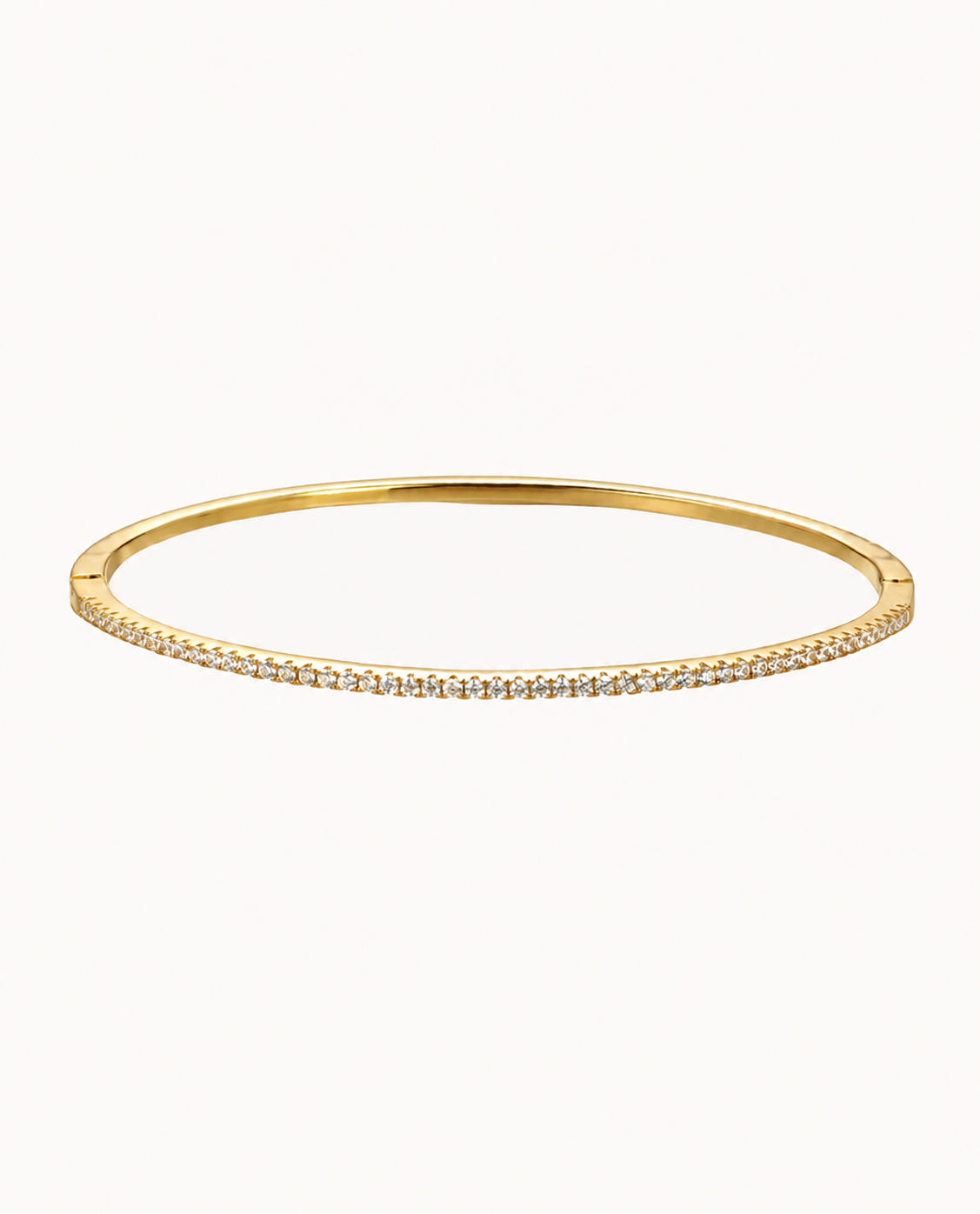 Alasia Bangle vergoldet – starres Armband mit einer Reihe klarer Zirkone