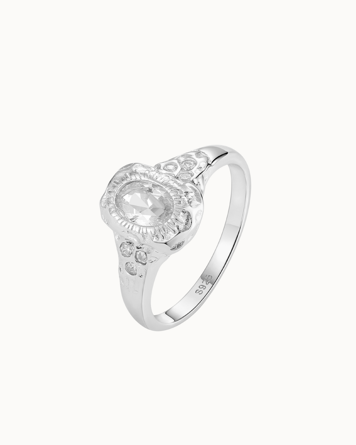 Atum ring in 925 sterling silver with large clear zirconia and texture like sun rays