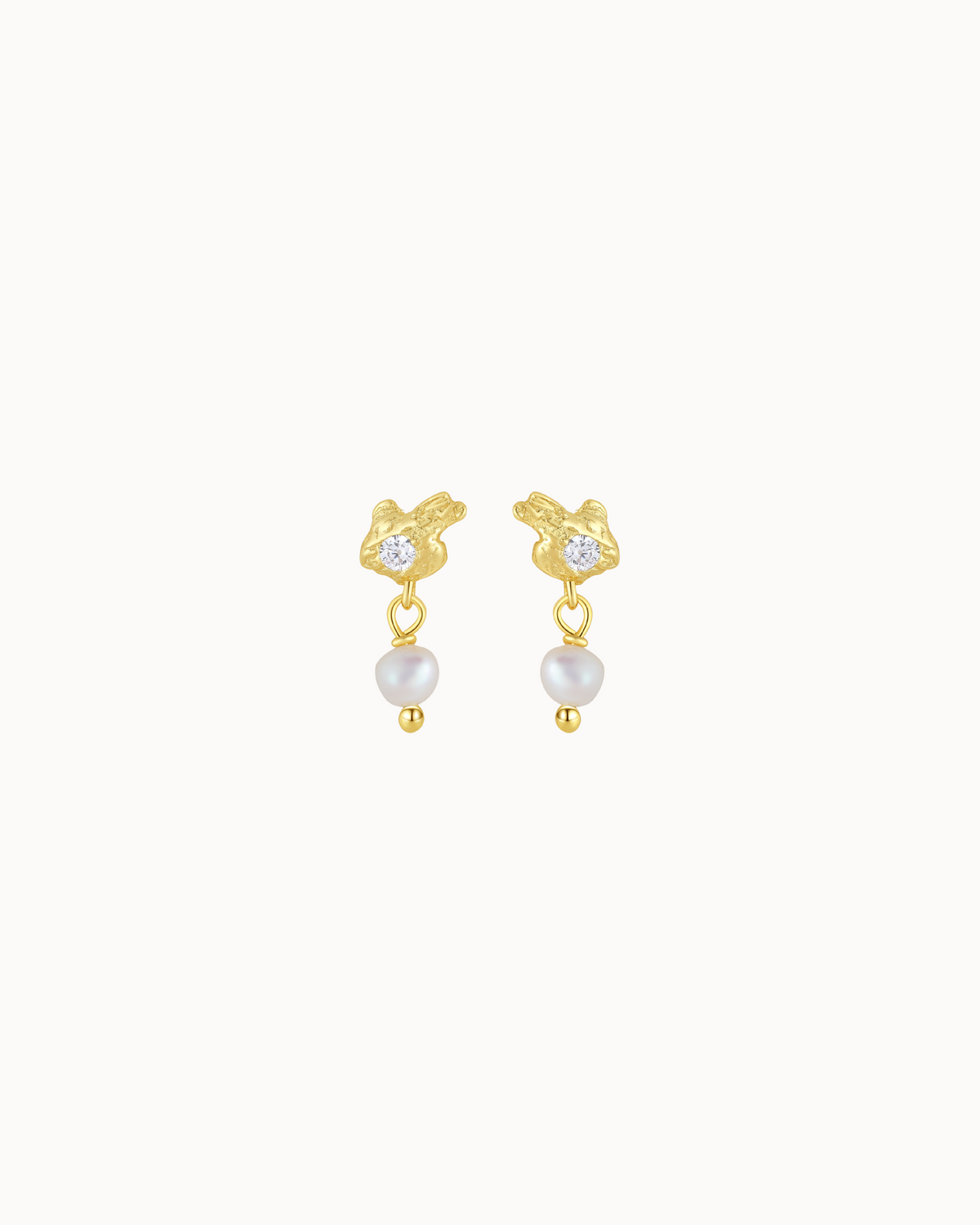 Avani studs in 18K gold-plated sterling silver with zirconia and a small freshwater pearl