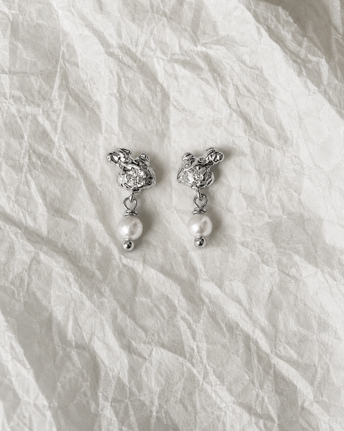 Avani oorknopjes van 925 sterling zilver met heldere zirkoon en zoetwaterparel