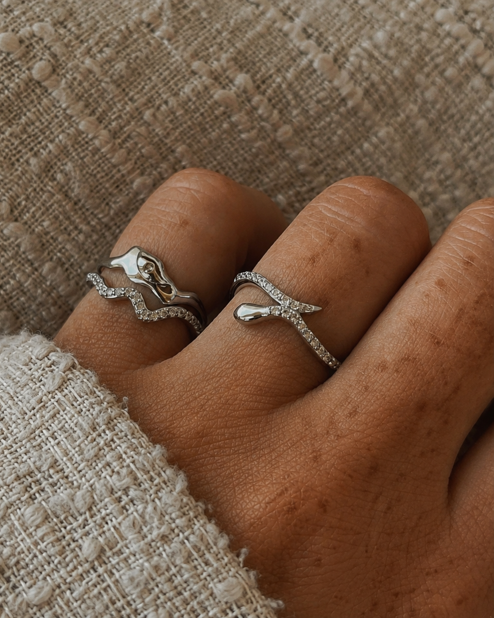 Boa snake ring in 925 sterling silver that winds around the finger, set with cubic zirconia