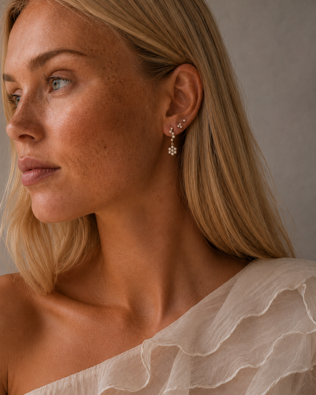 Calla øreringe i forgyldt sterlingsølv fra Tidal Blossom-kollektionen