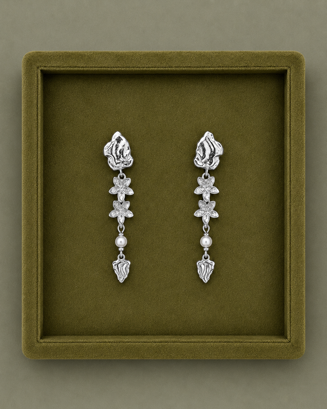 Haiti earrings in sterling silver with two fine flowers and a small pearl