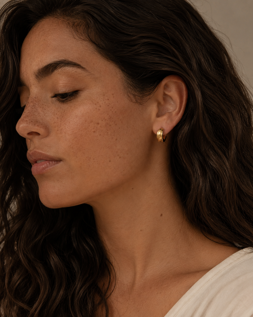 Indie gold-plated hoops with a chunky, rounded shape