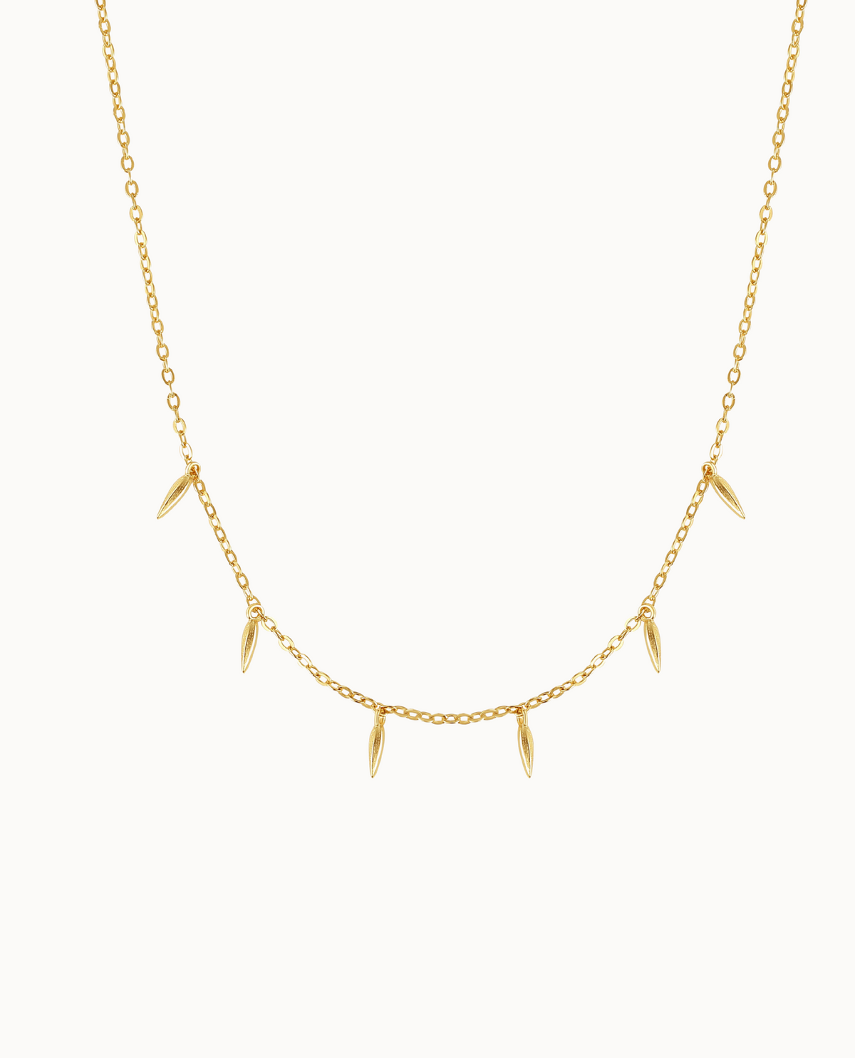 Jia Necklace in 18K gold-plated sterling silver with small bamboo leaves as pendants
