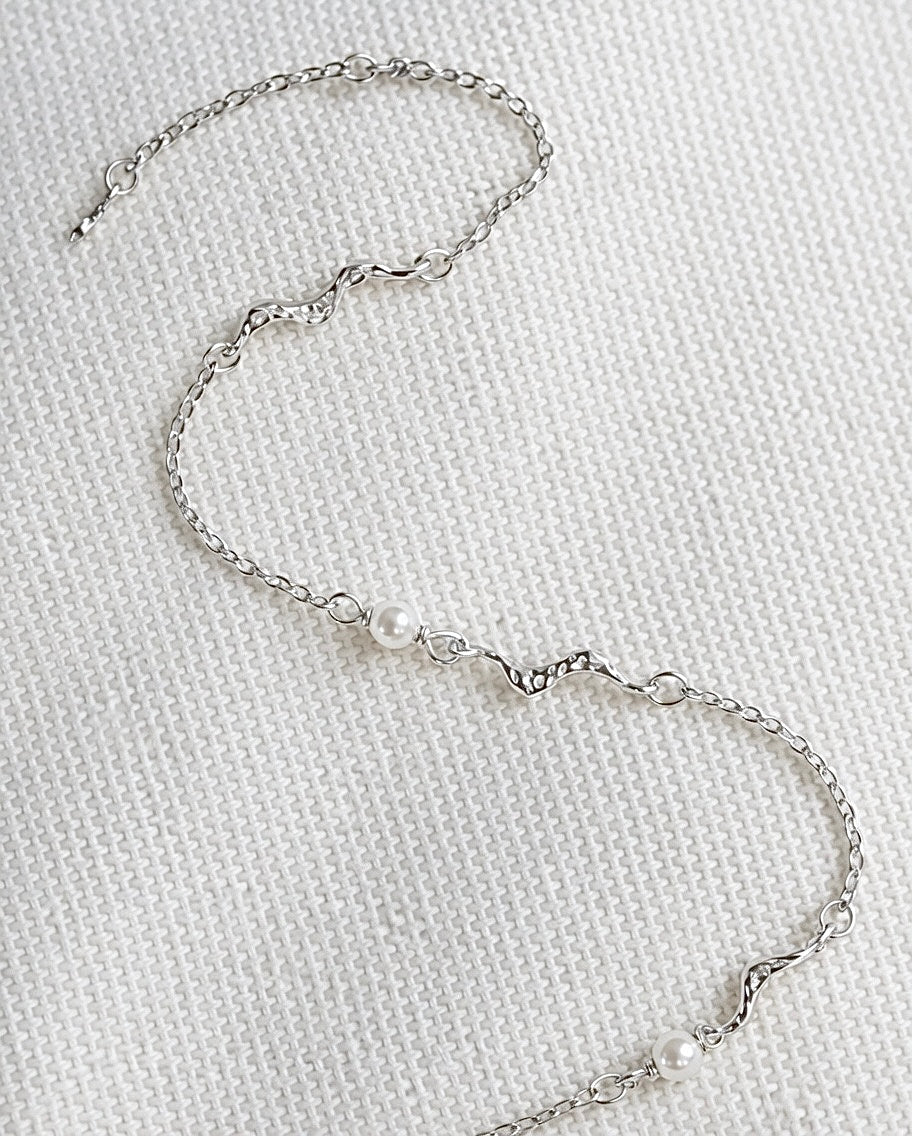 Elegant Kaito armbånd i sølv med diskret perle af naturligt perlemor