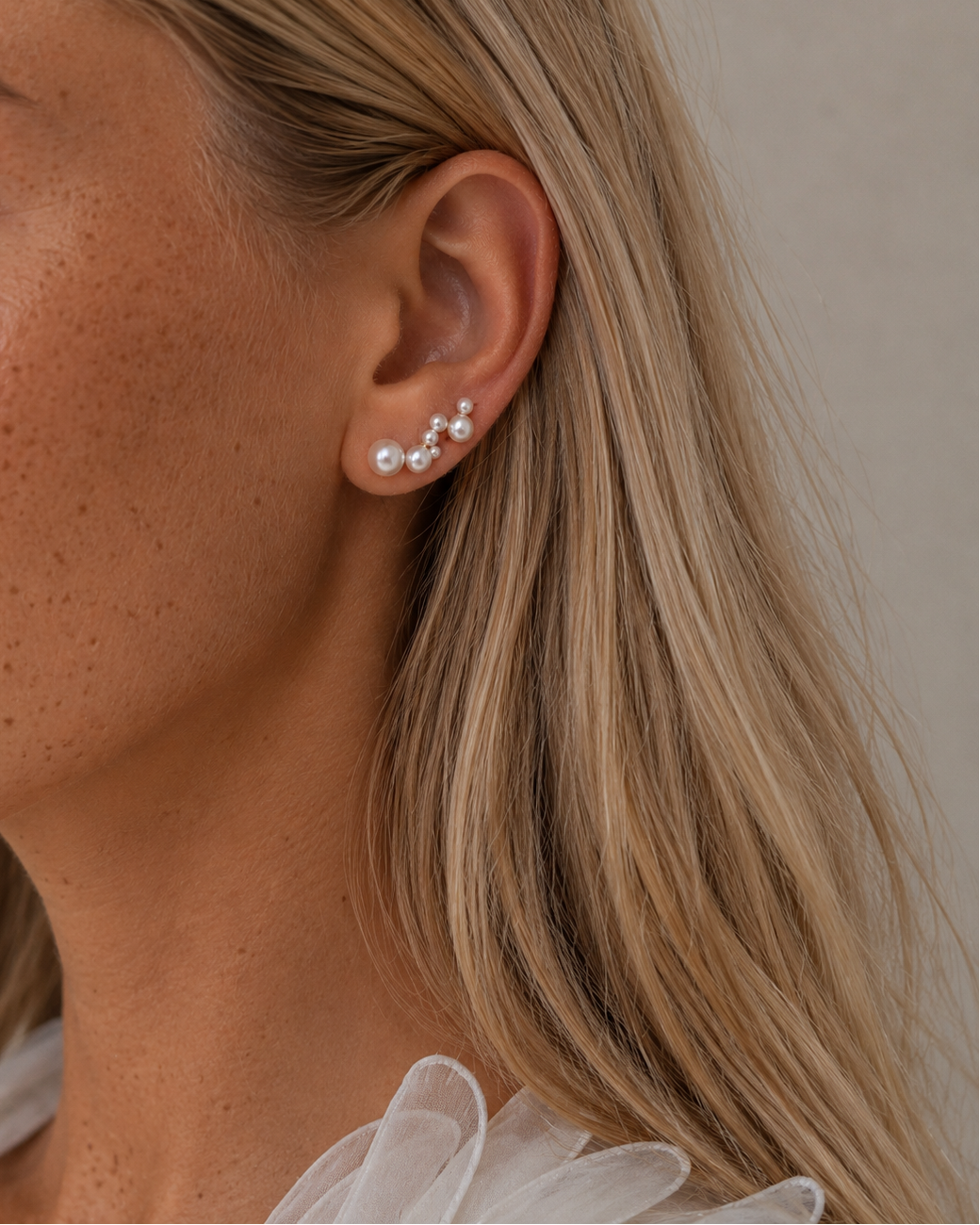 Gold-plated Meghana ear climber with pearls in different sizes