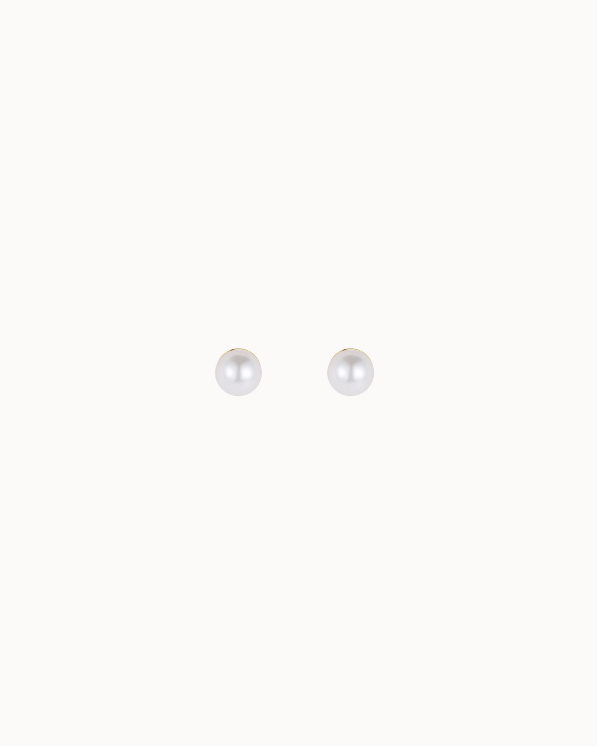 Mira Petite Studs in 18K gold-plated sterling silver with one small pearl