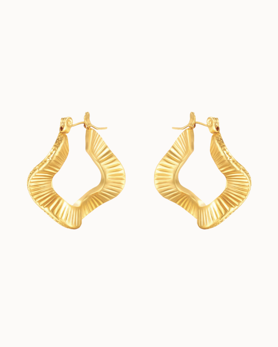 Mirage hoops in waterproof 18K gold-plated stainless steel with wavy, sculptural design