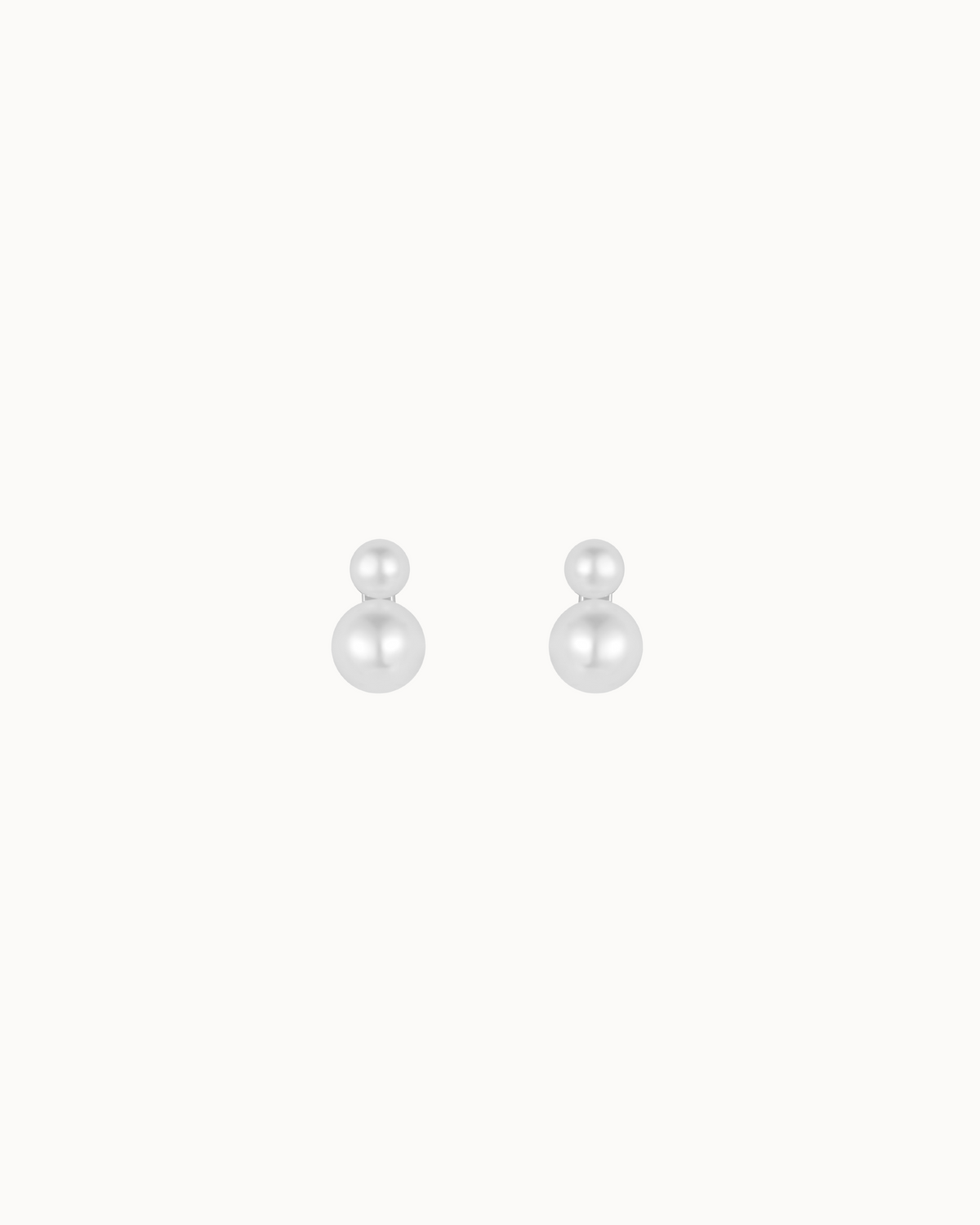 Nahla Petite Studs in 925 sterling silver with two small pearls in different sizes