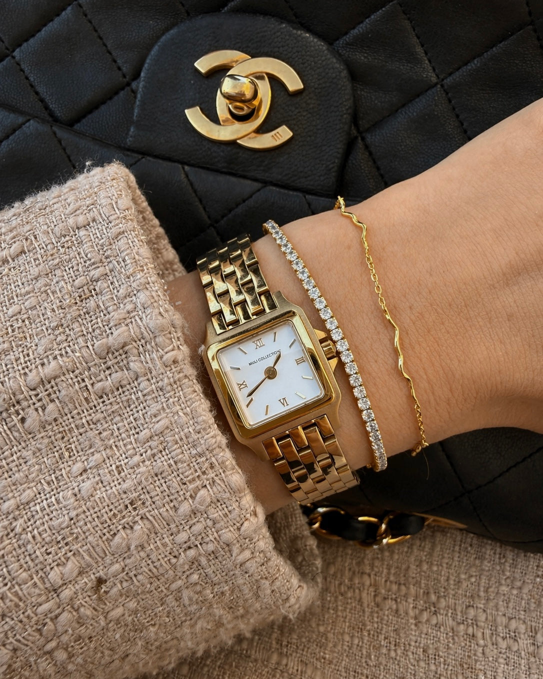 Gold-plated Nerina bracelet and Oraya tennis bracelet styled together