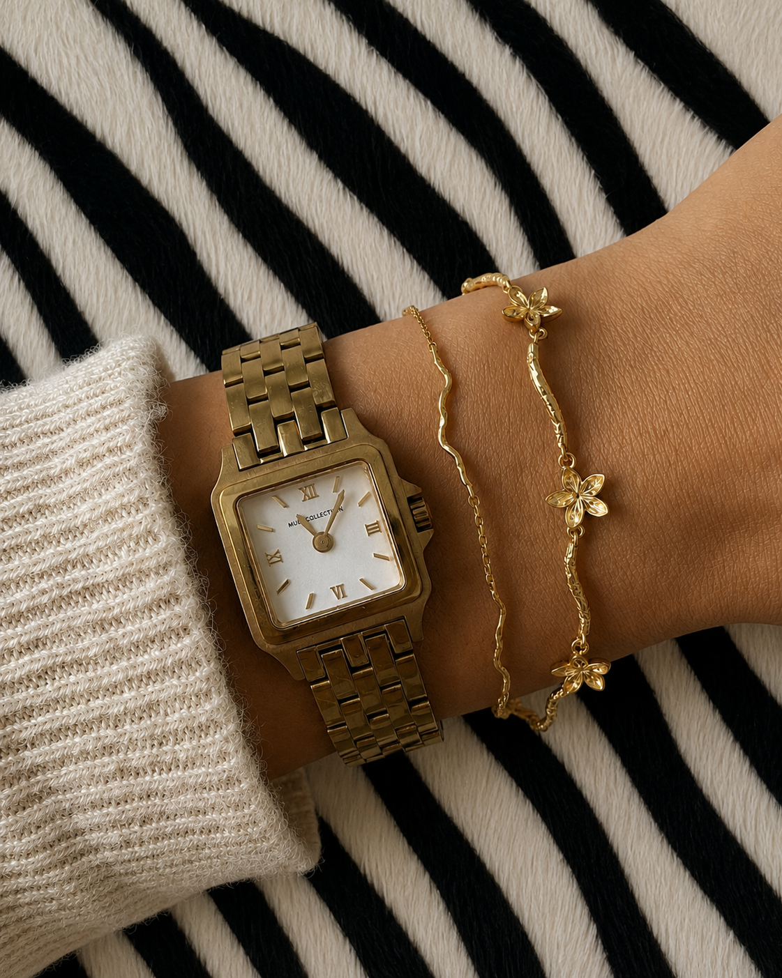 Gold-plated Oahu and Nerina bracelets styled together