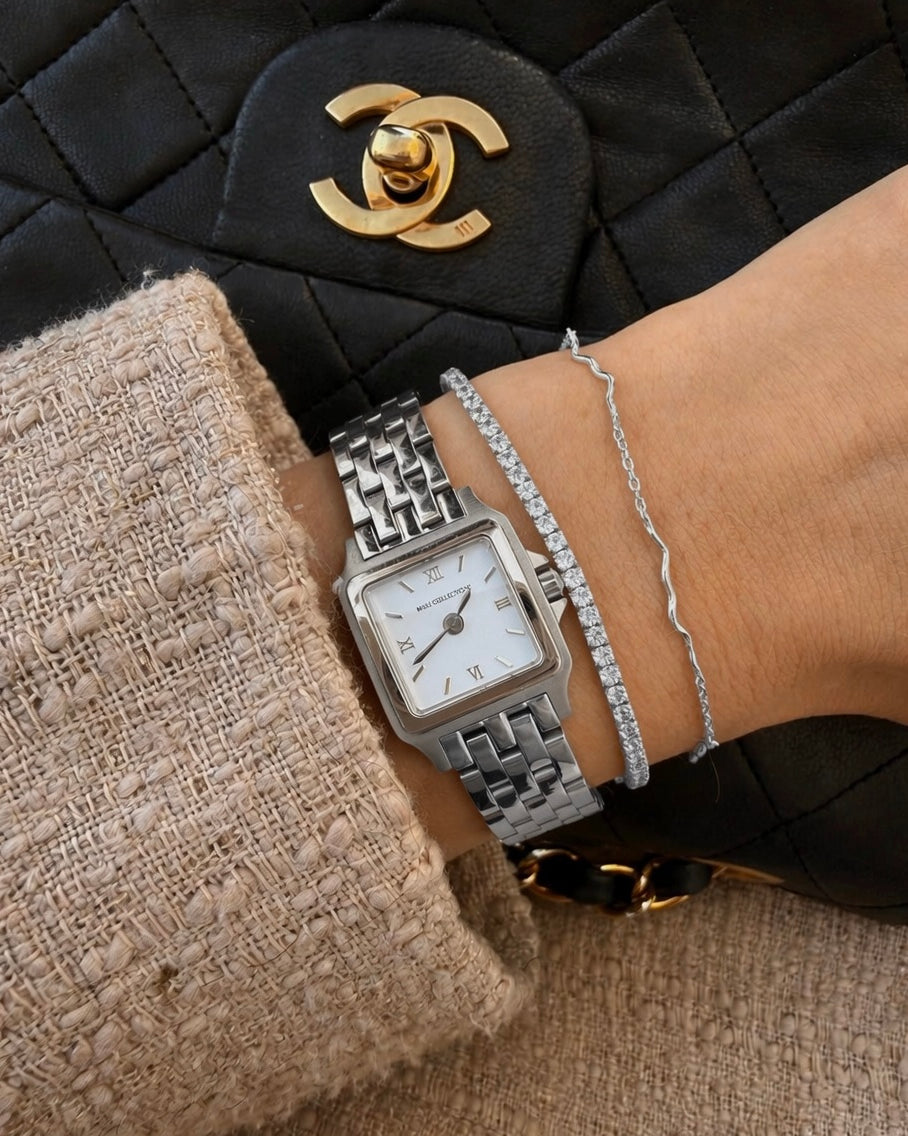 Silberfarbene Oraya und Nerina Armbänder zusammen gestylt