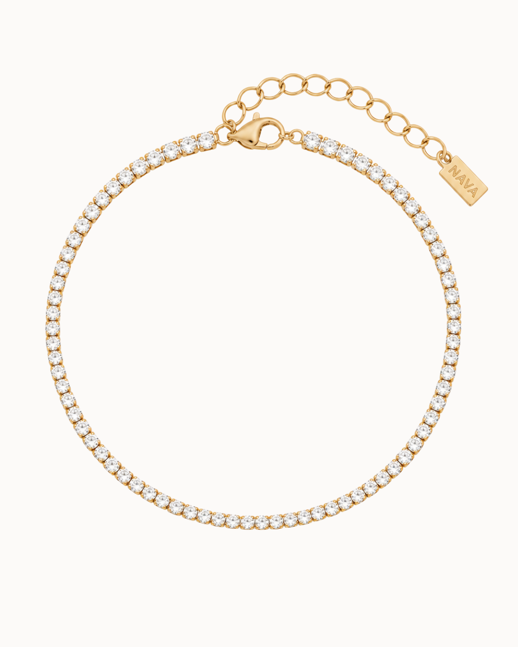Oraya 2 mm tennisarmbånd lagt rundt, forgyldt med klare zirkoner