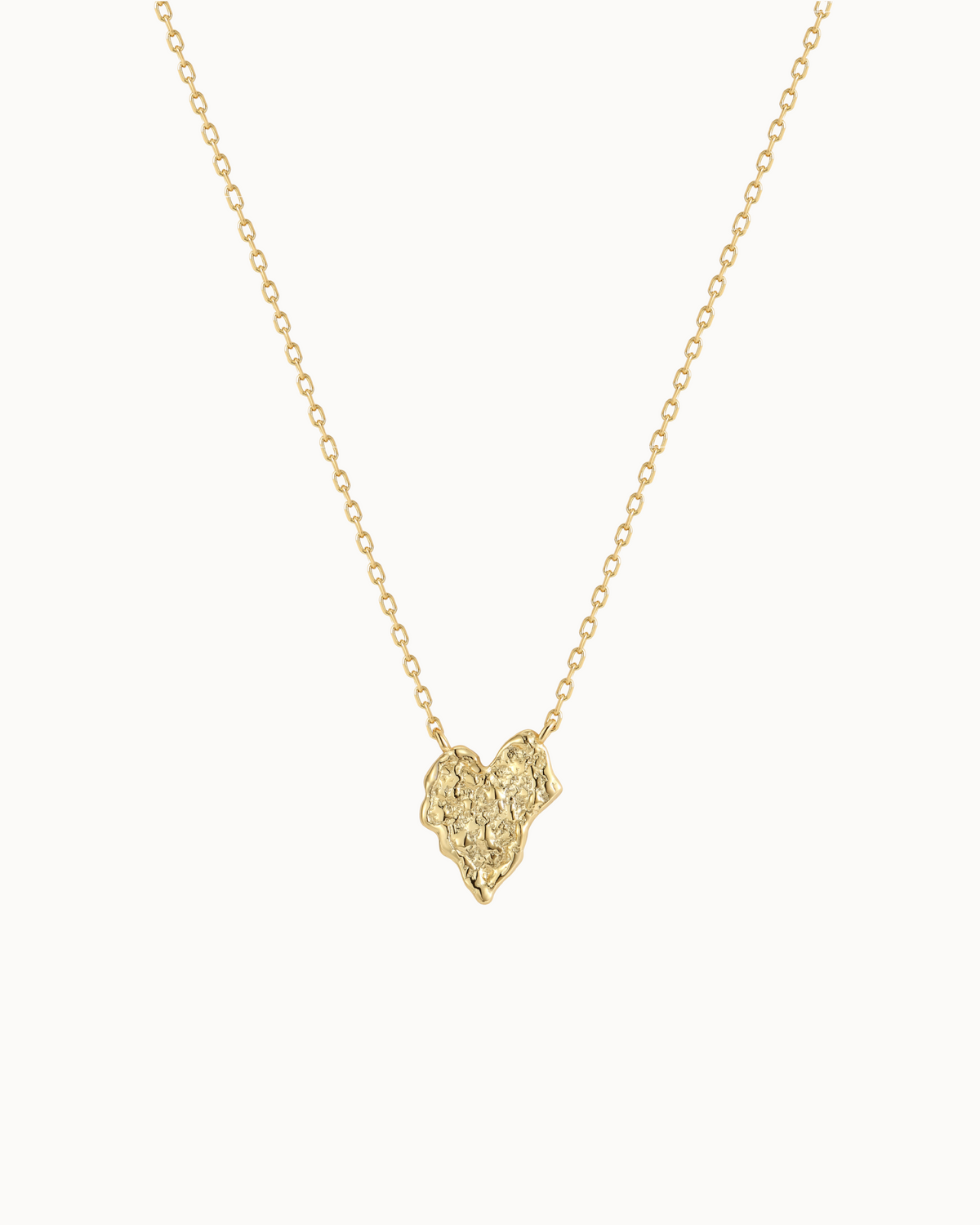 Palila Necklace in 18K gold-plated sterling silver with heart-shaped pendant and raw surface