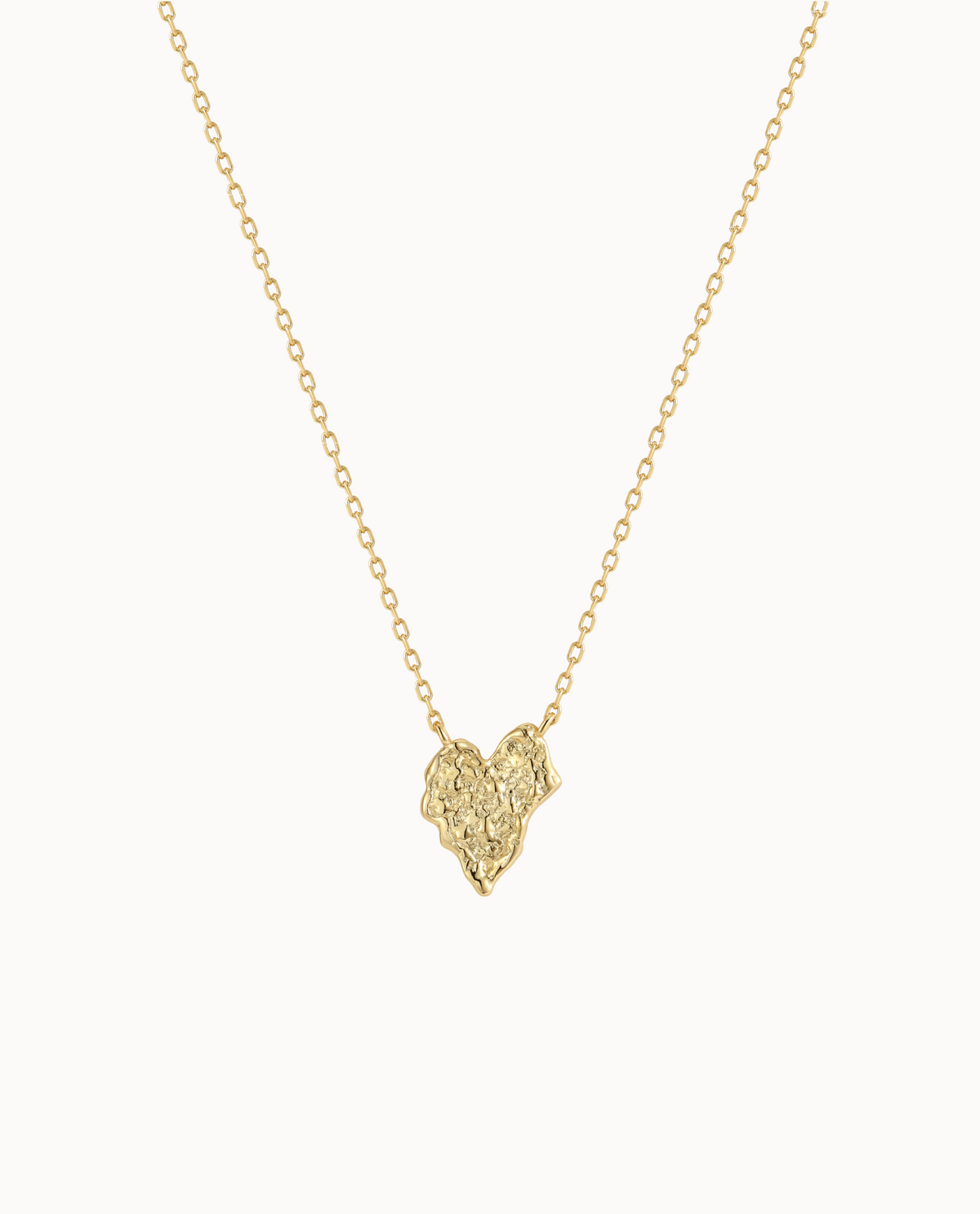 Palila Necklace in 18K gold-plated sterling silver with heart-shaped pendant and raw surface