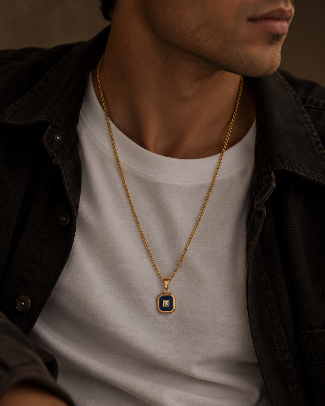 Gold-plated Romeo men's necklace with a deep blue stone and clear zirconia in the centre