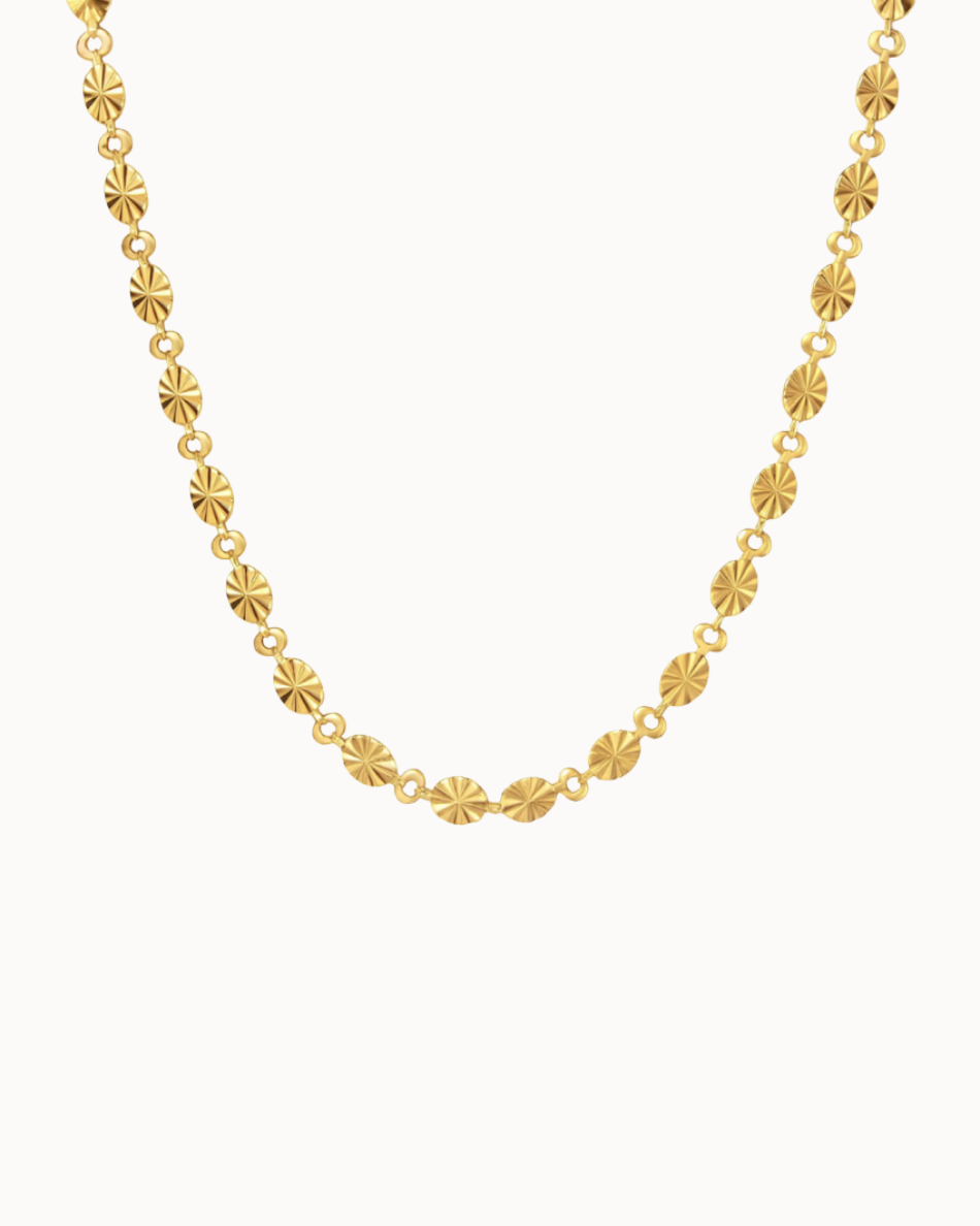 Soleil necklace in waterproof 18K gold-plated stainless steel with small faceted discs