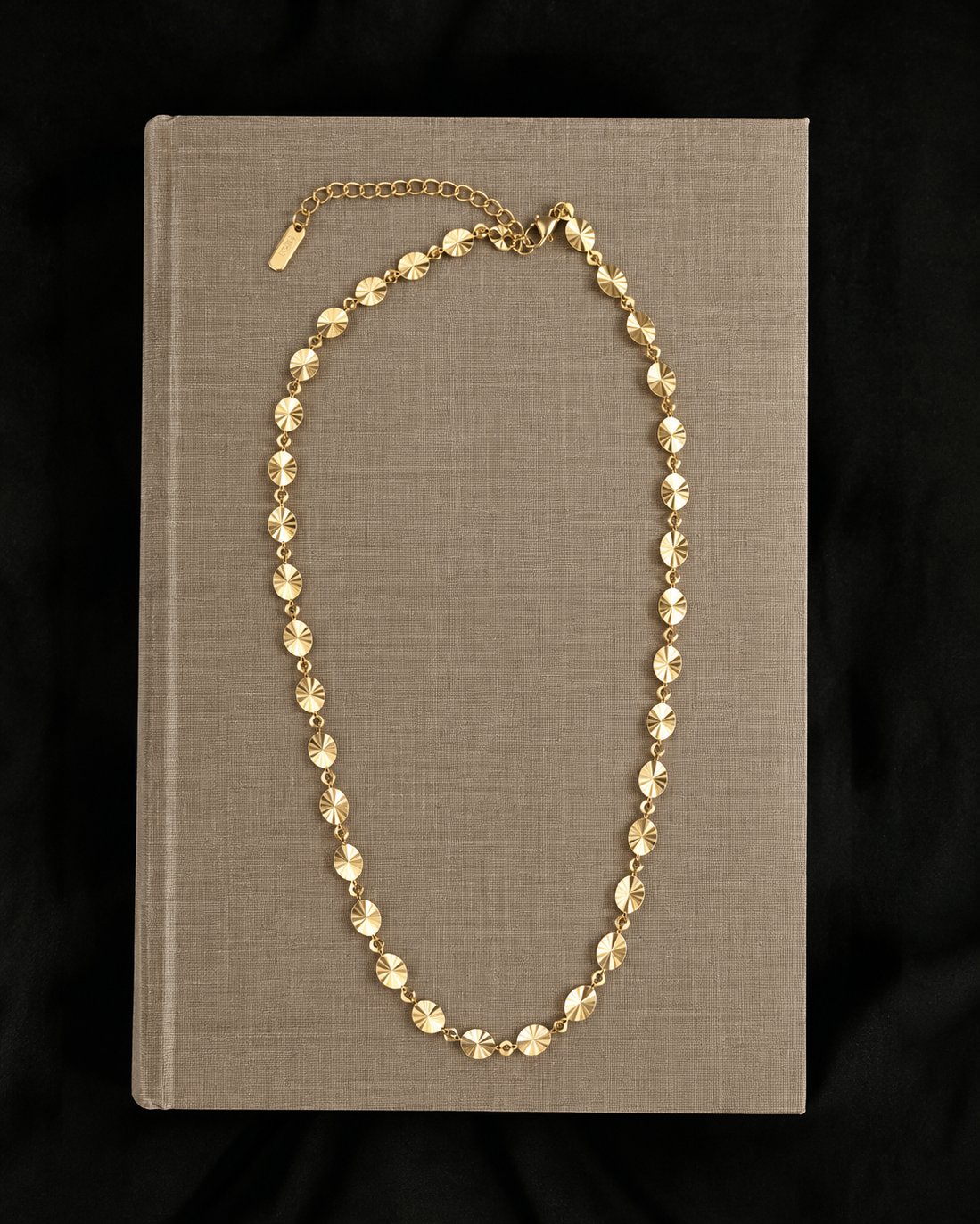Gold-plated Soleil necklace with faceted links that catch the light from every angle