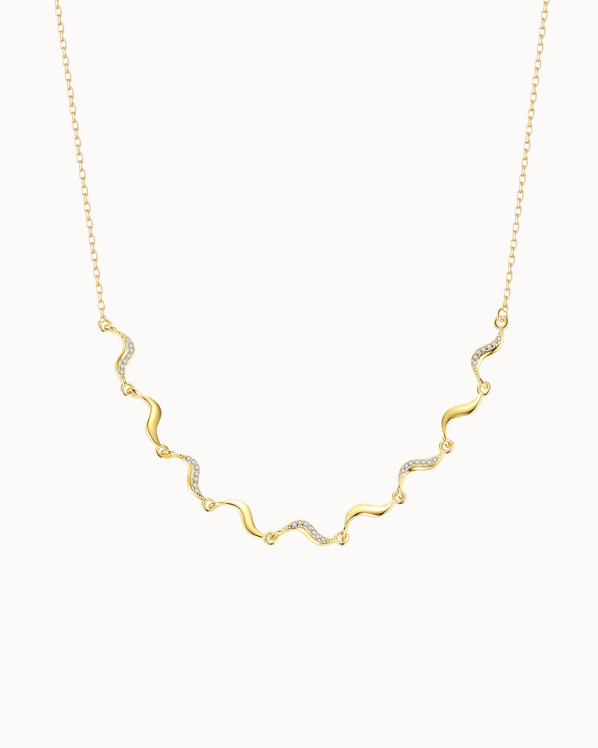 Stella Necklace aus 18K vergoldetem Sterlingsilber mit kleinen Anhängern und klaren Zirkonen