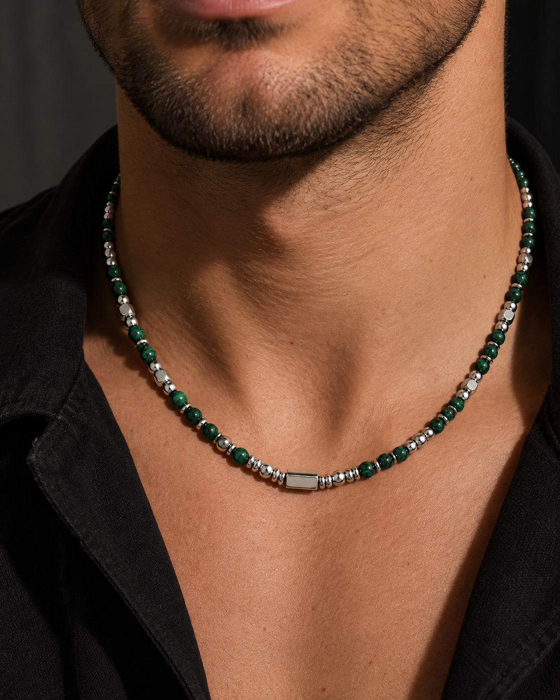 Zayn necklace with green malachite worn on the man's neck