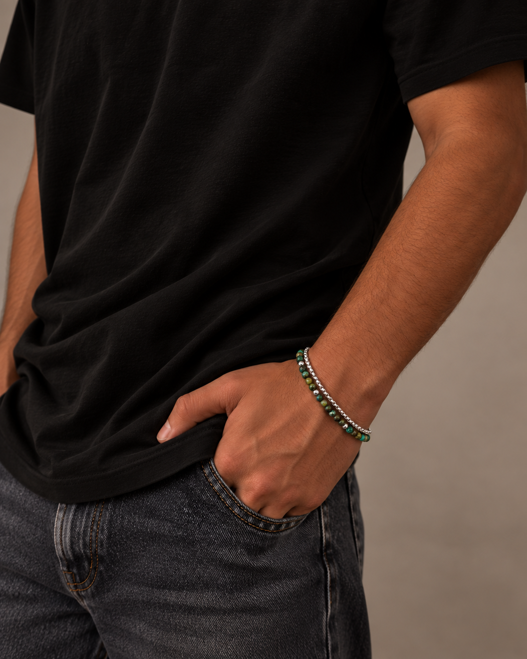 Detail of Ares men's bracelet with green and earthy stone beads