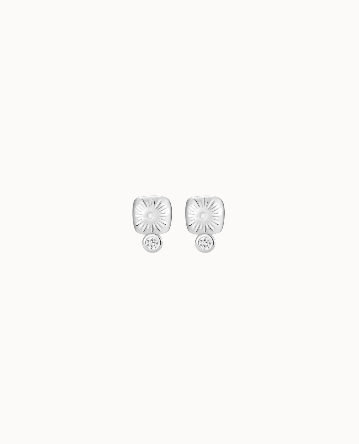 Ash Petite studs in 925 sterling silver with sun detail and glittering zirconia