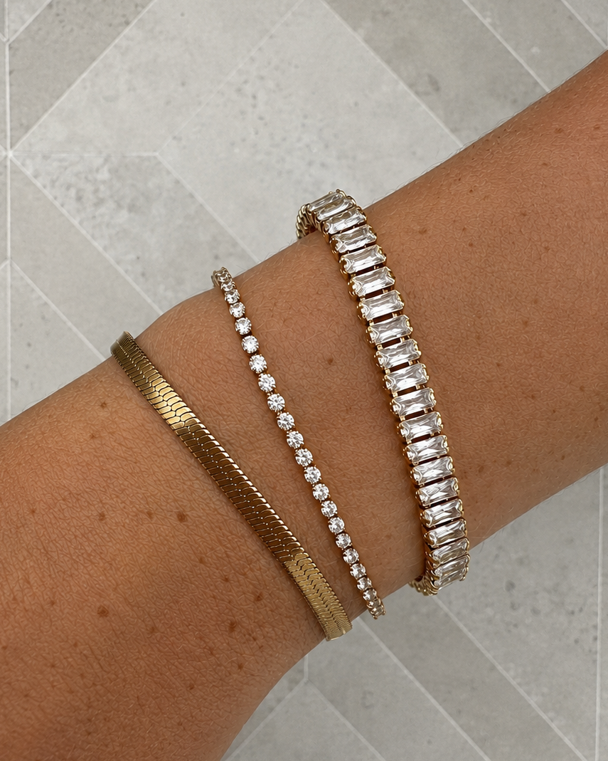 Celestia, tennisarmbånd og Flat Snake i forgyldt look kombineret