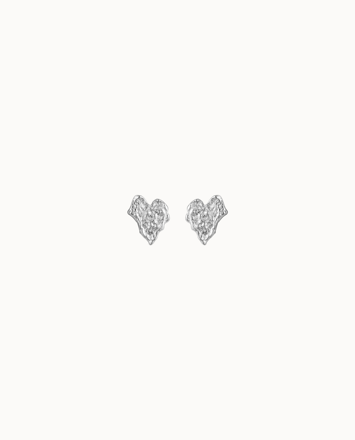 Cove Petite Studs in 925 sterling silver – small heart-shaped studs with raw surface