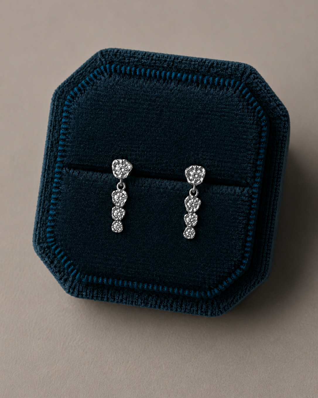 Cressida silver studs with a soft, continuous design