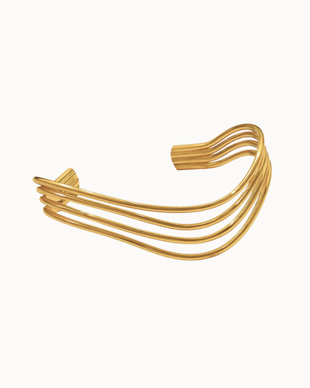 Flown Bangle – breiter vergoldeter Armreif mit organischer, welliger Form