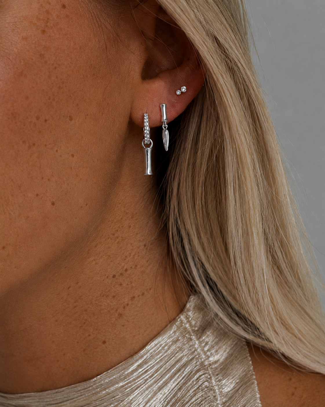 Hai and Nuo silver earrings with bamboo design, combined