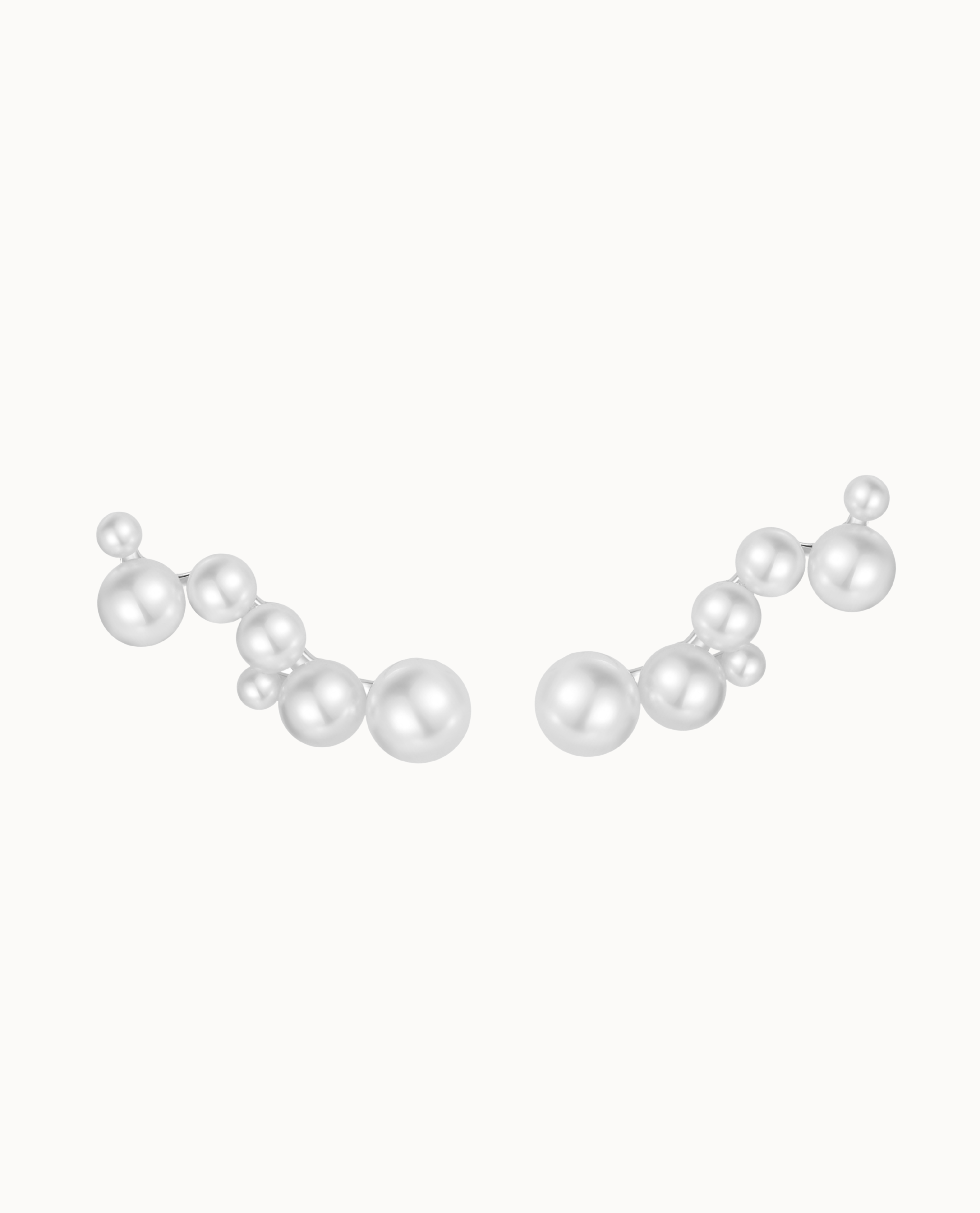 Meghana Ear Climber in 925 sterling silver with pearls that follow the curve of the ear