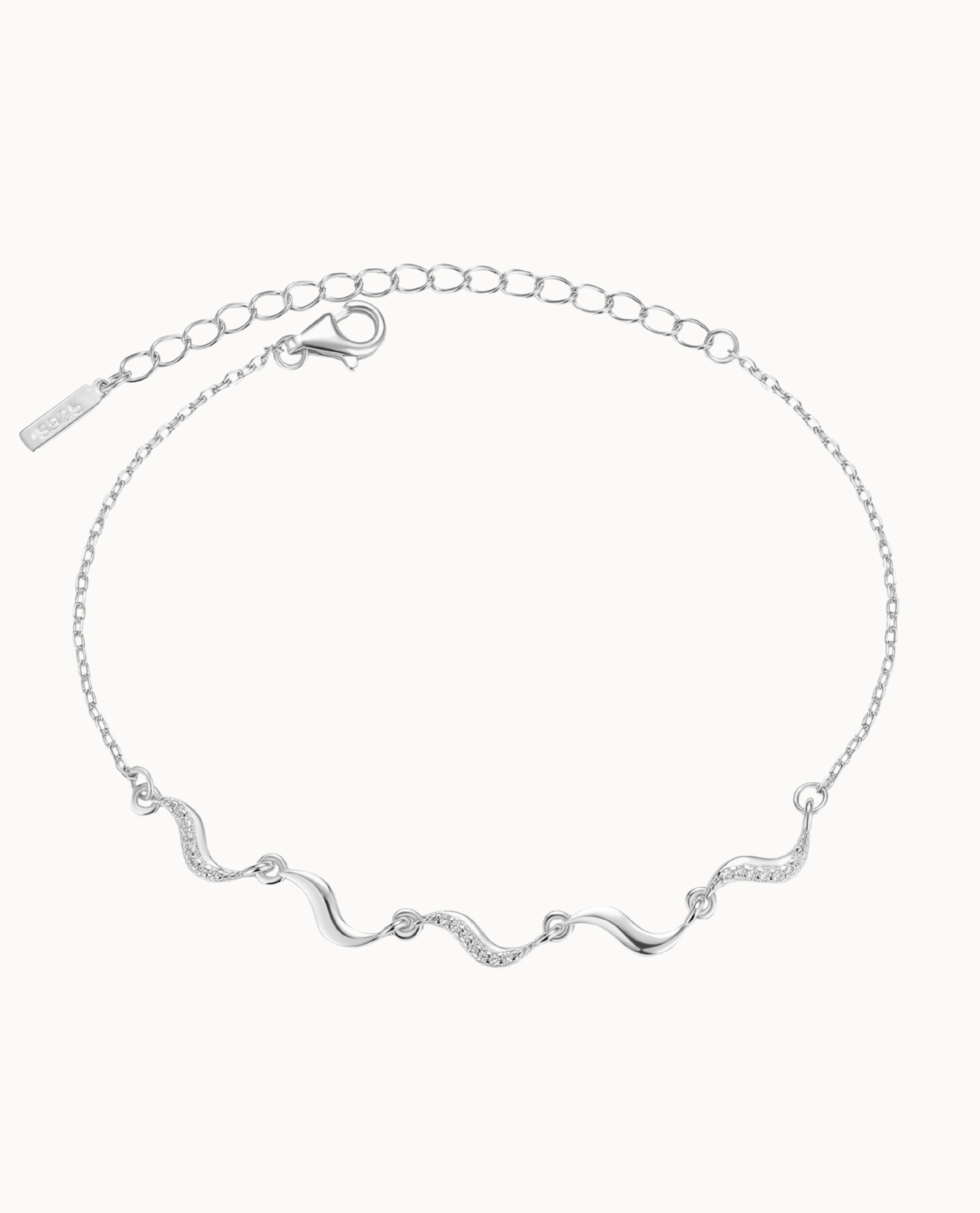 Nova Bracelet i 925 sterlingsølv med små vedhæng og klare zirkoner