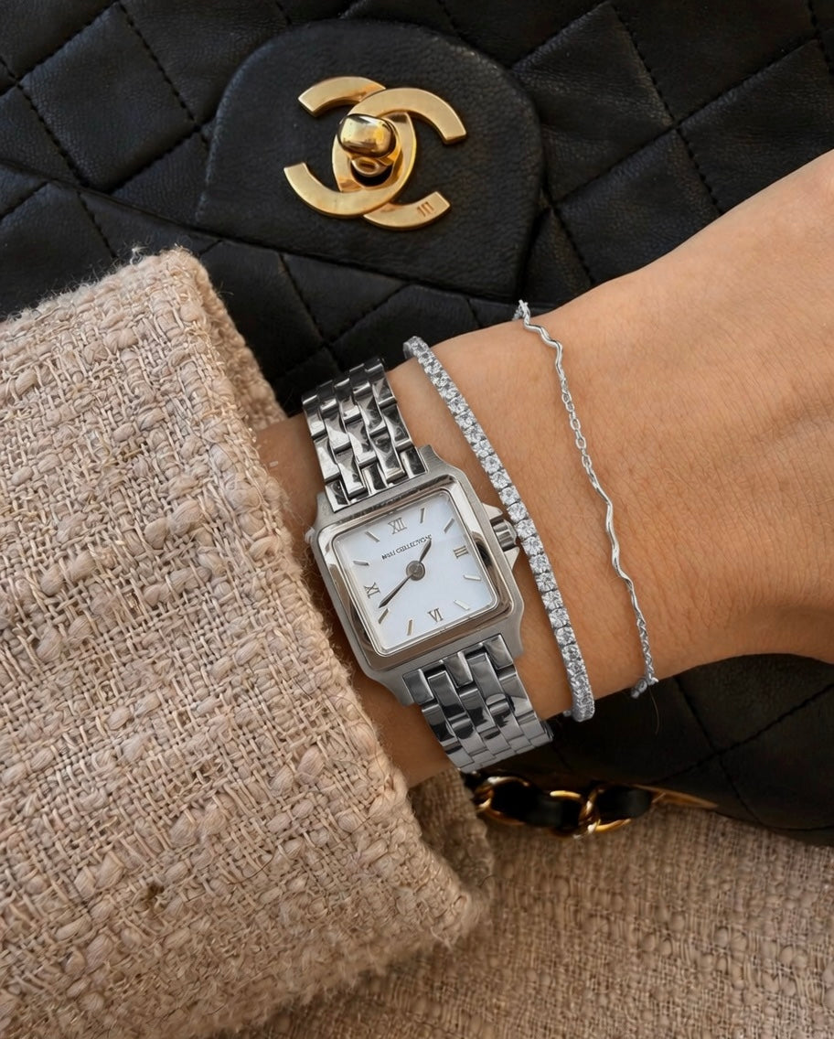 Silver-coloured Oraya and Nerina bracelets styled together
