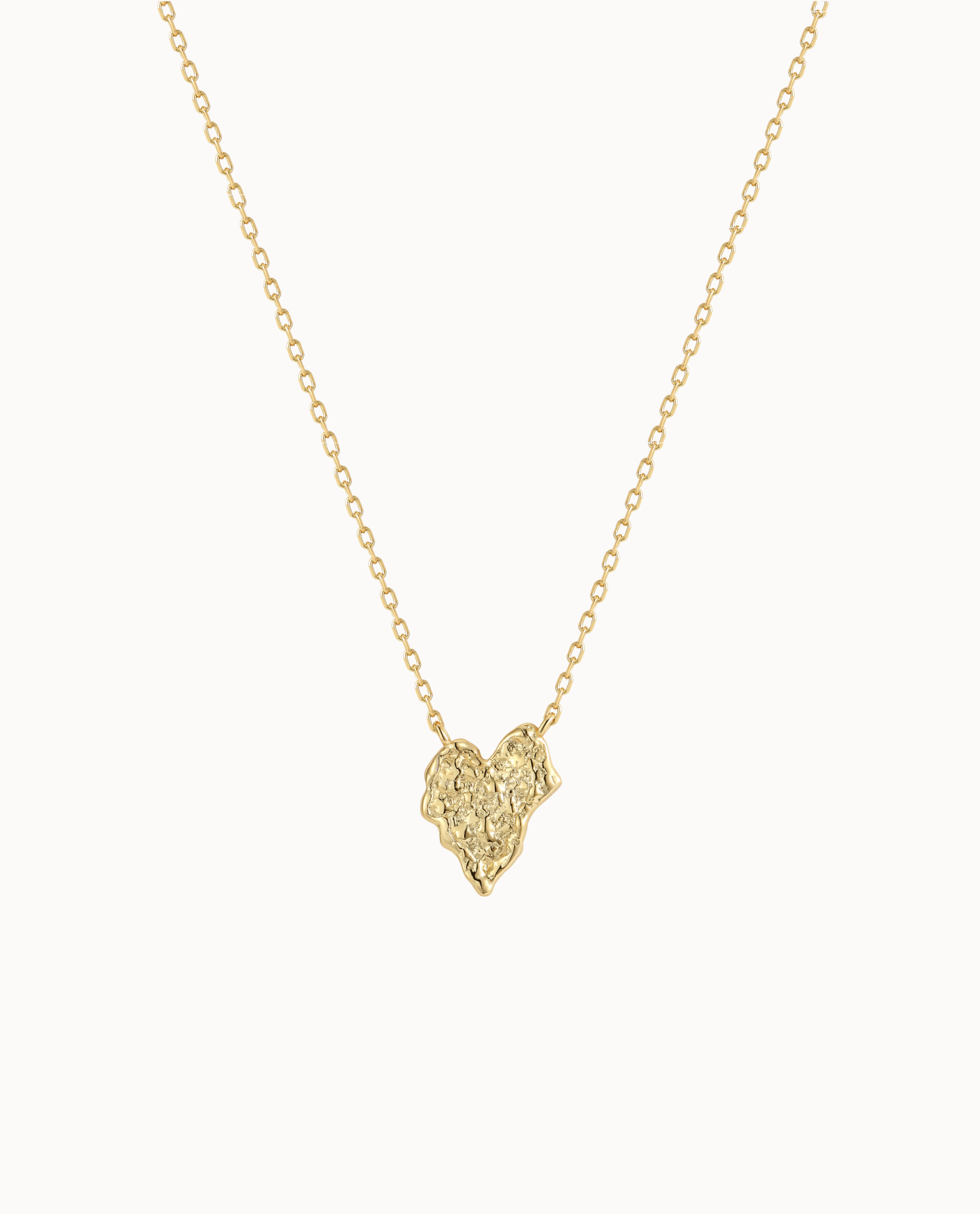 Palila Necklace in 18K gold-plated sterling silver with heart-shaped pendant and raw surface