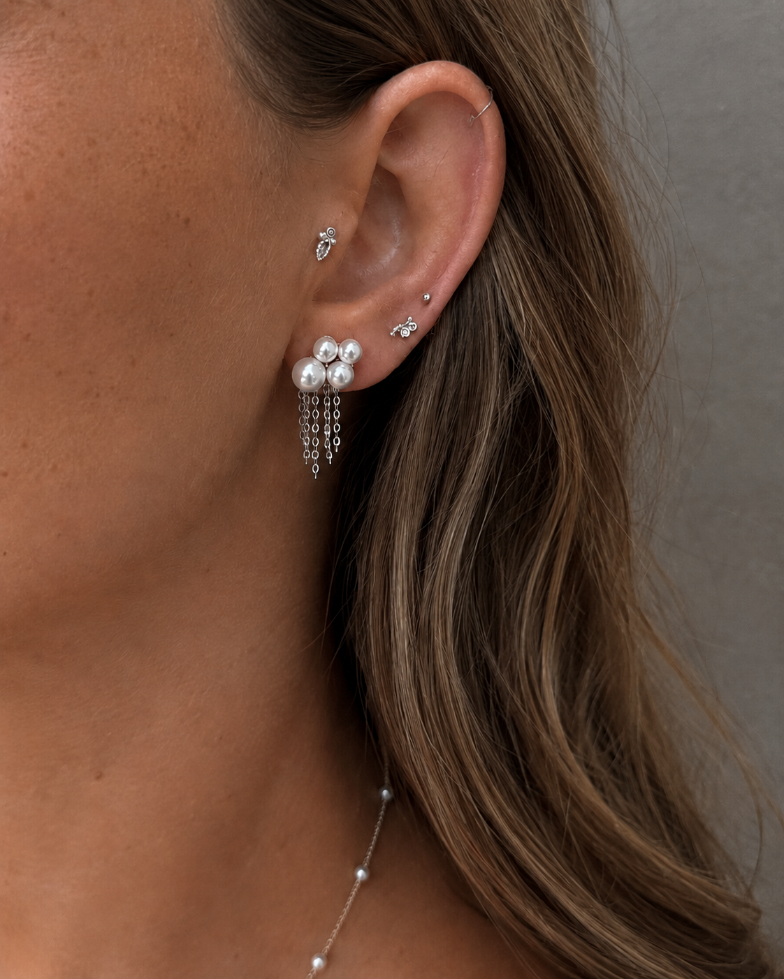 Pelagia oorbellen in 925 sterling zilver met kettinkjes die als kleine franjes vallen