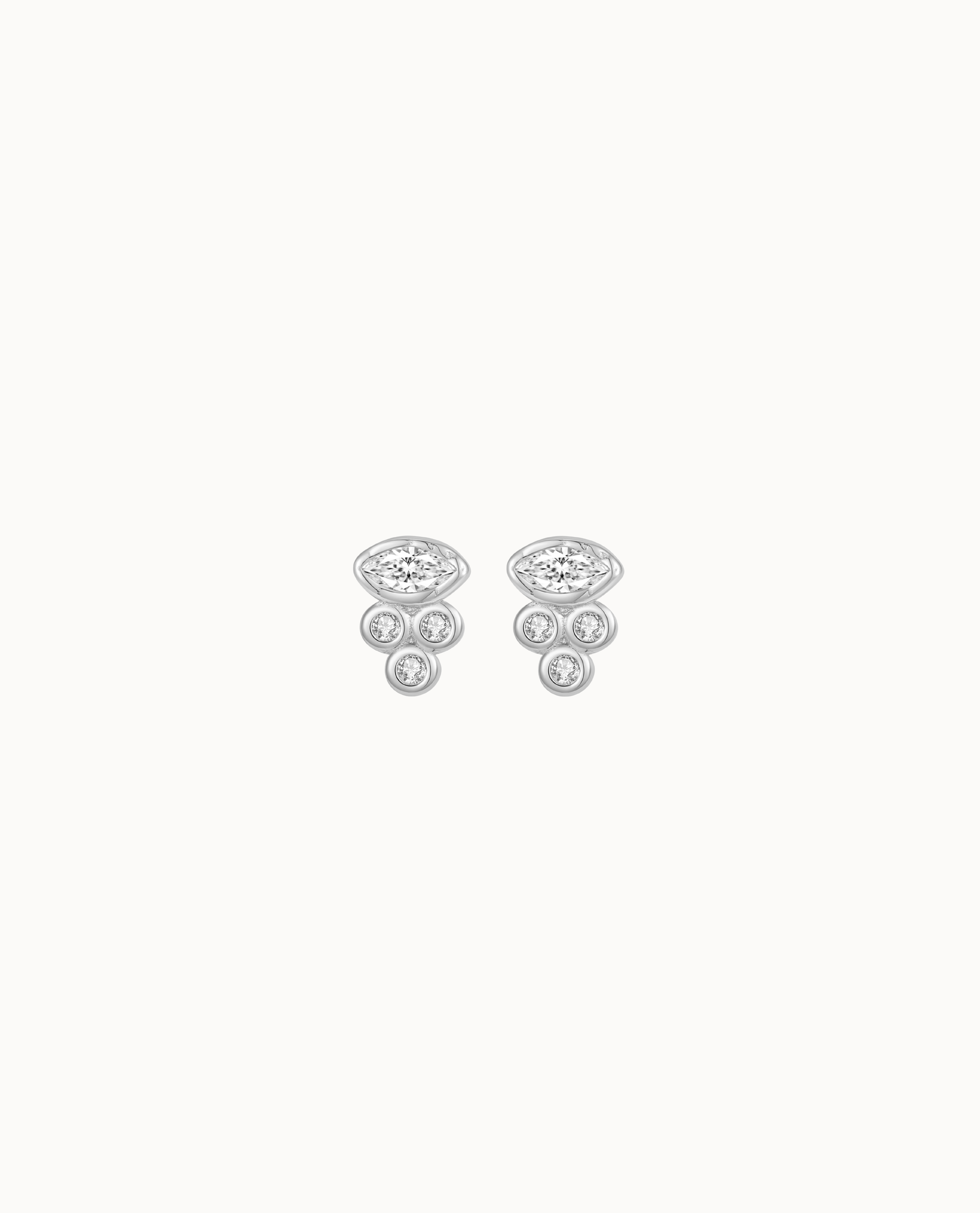 Ra Petite studs in 925 sterling silver with eye-shaped zirconia and three round zirconia