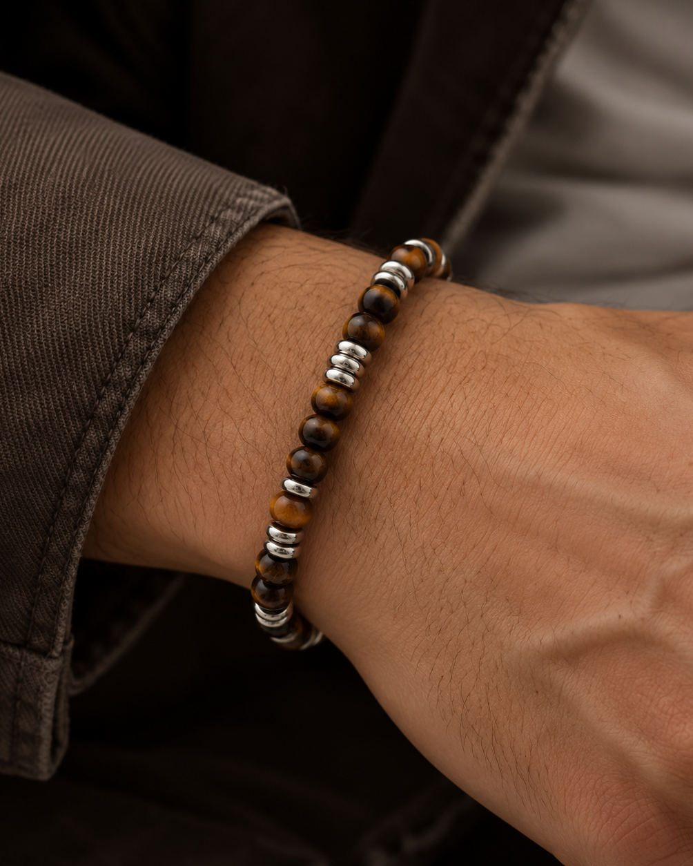 Santos men's bracelet in a beaded design with tiger's eye and shiny steel