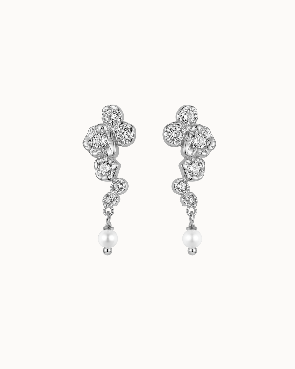 Solenne Earrings i 925 sterlingsølv med små sten og en lille perle