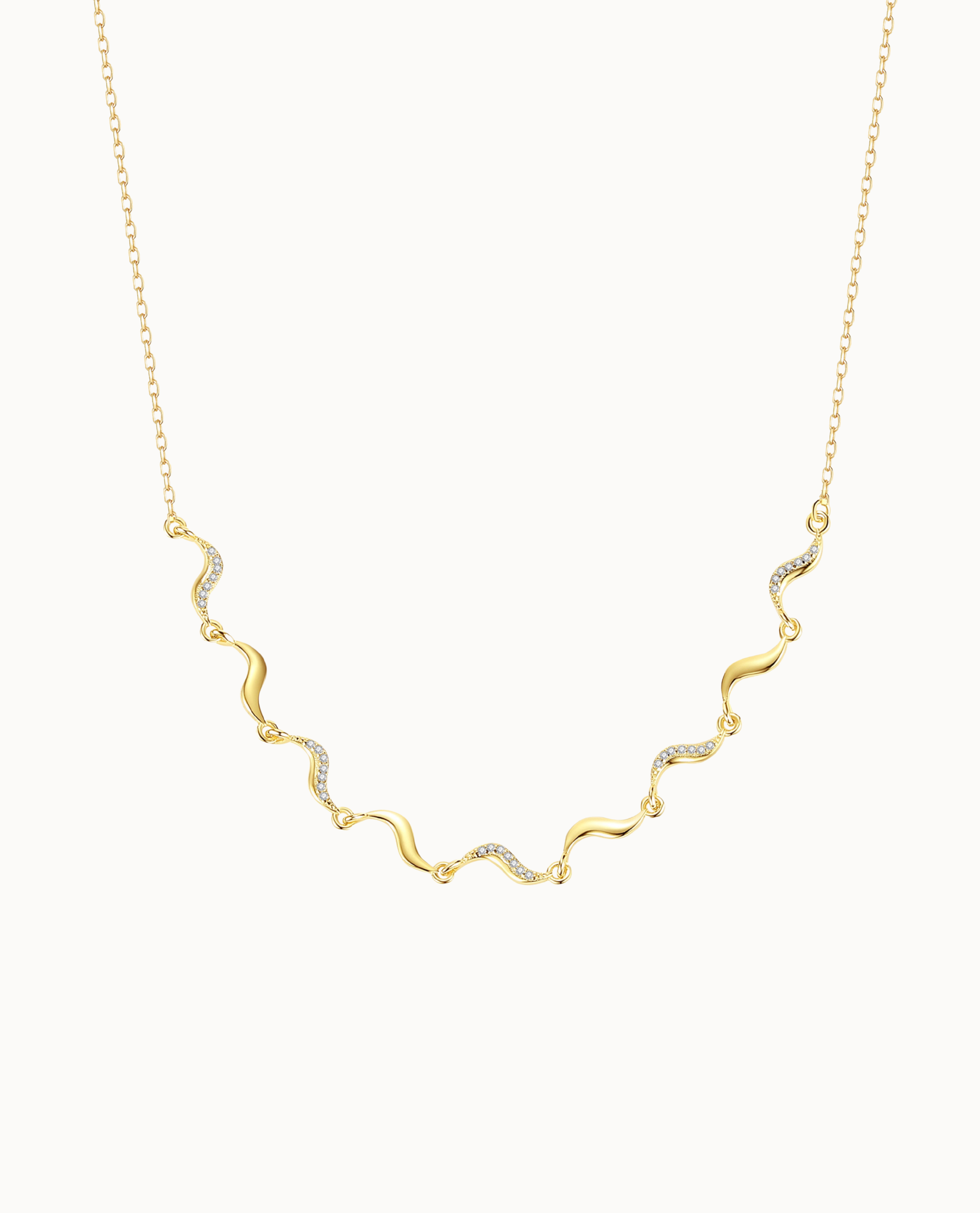 Stella Necklace i 18K forgyldt sterlingsølv med små vedhæng og klare zirkoner