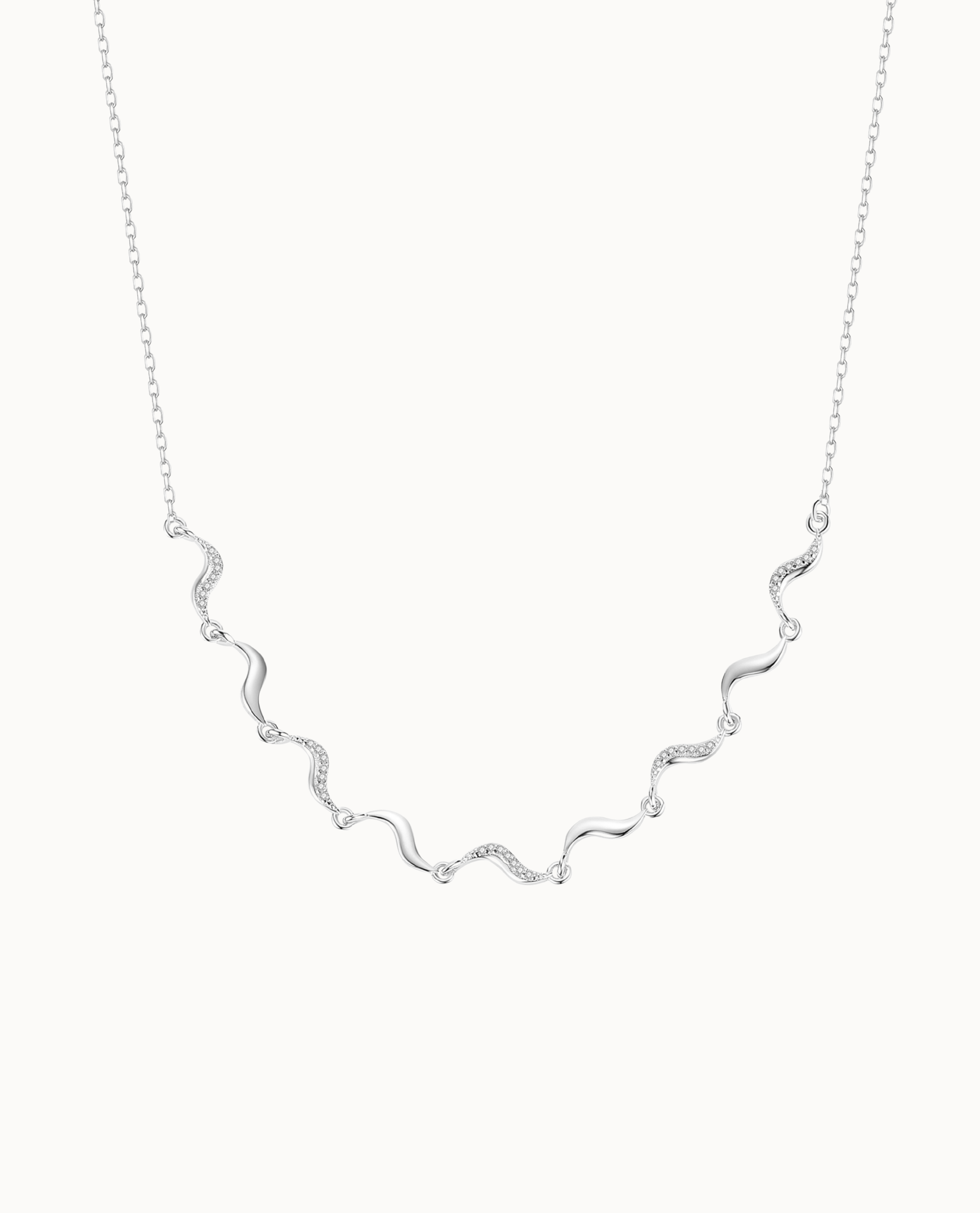Stella Necklace i 925 sterlingsølv med små vedhæng og klare zirkoner