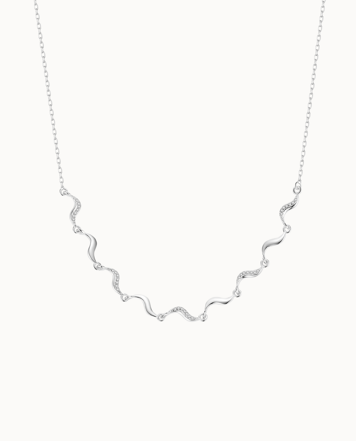 Stella Necklace i 925 sterlingsølv med små vedhæng og klare zirkoner