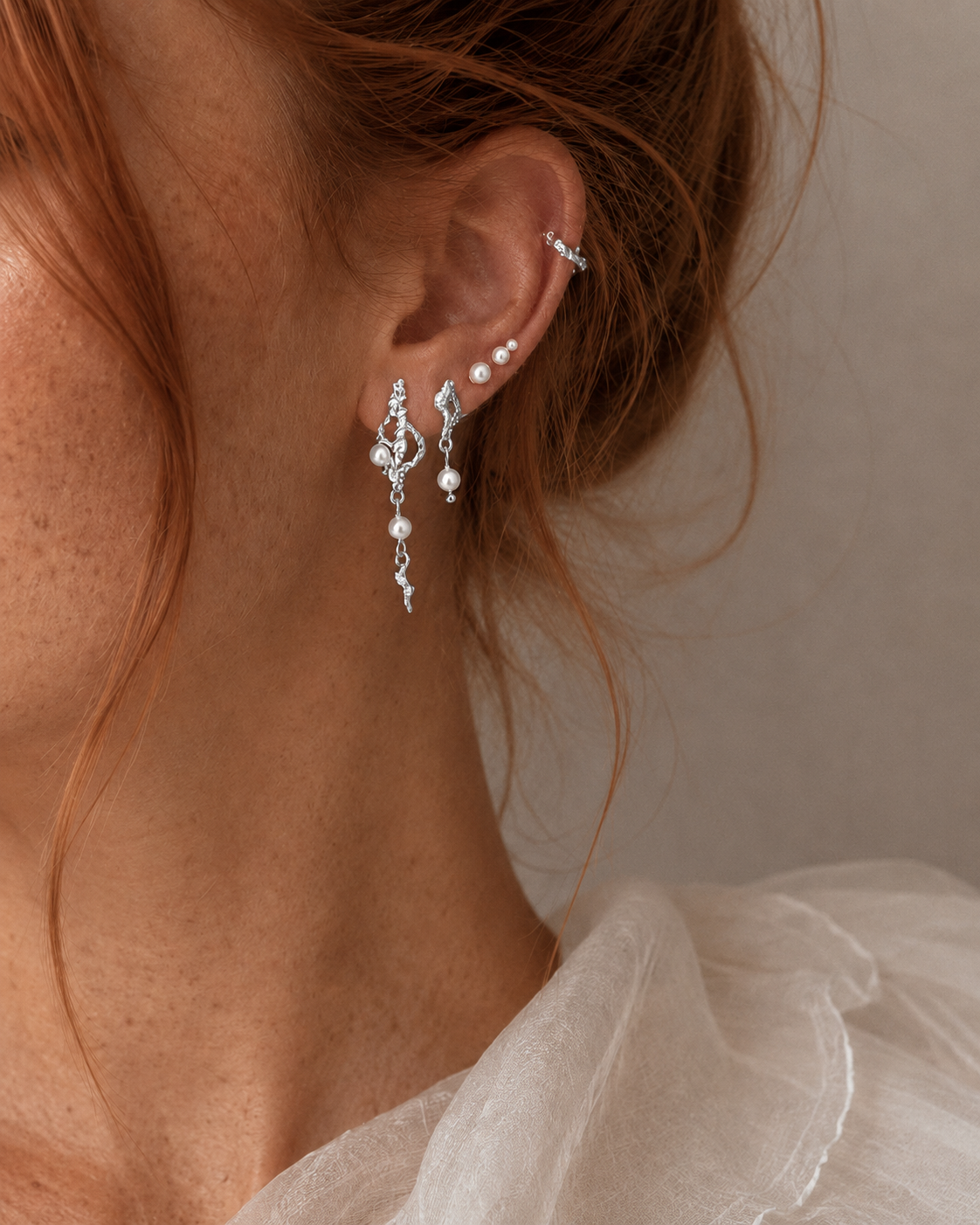 Zale Earrings i 925 sterlingsølv med organiske former og perlemorsperler