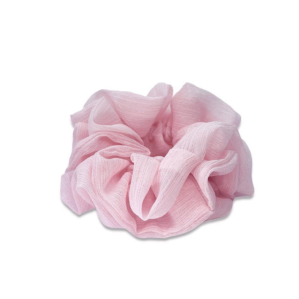Ivy scrunchie is a must have in your accessory collection! It's an oversized scrunchie with shimmer which creates a puffy look in your hair. Use it in a messy bun or to spice up your ponytail.  